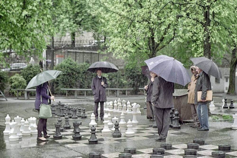 "Chess in the rain," by Flickr user Kelvin Pulker. https://www.flickr.com/photos/soundslogical/