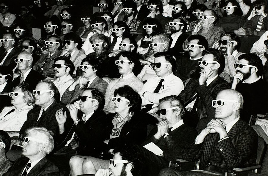 Title: Theater audience wearing 3-d glasses | Author: Burns Library, Boston College | Source: bc-burnslibrary on Flickr | License: CC BY-NC-ND 2.0