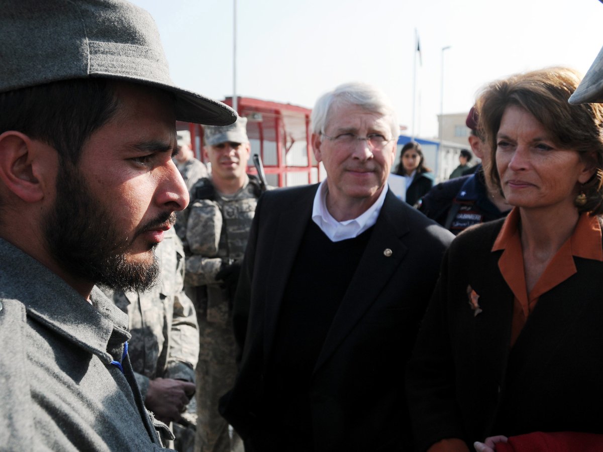 Title: U.S. Senators Lisa Murkowski and Roger F. Wicker speak with an Afghan Nation Police Officer at the Central Training Facility | Author: F. Julian Carroll | Source: NATO Training Mission-Afghanistan | License: CC BY-SA