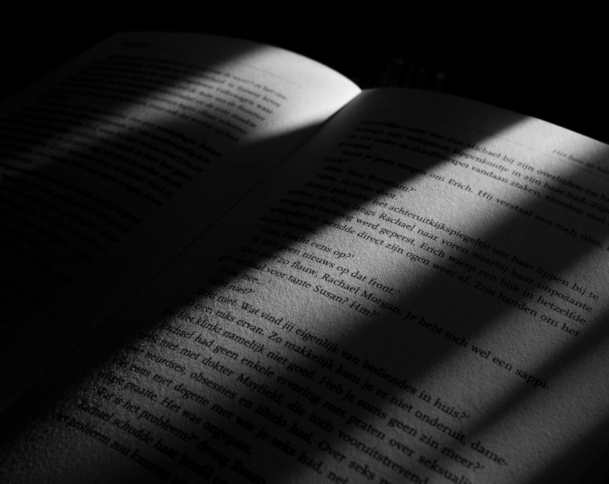 Light on a book | Author: Maxim Hopman (https://unsplash.com/@nampoh)
