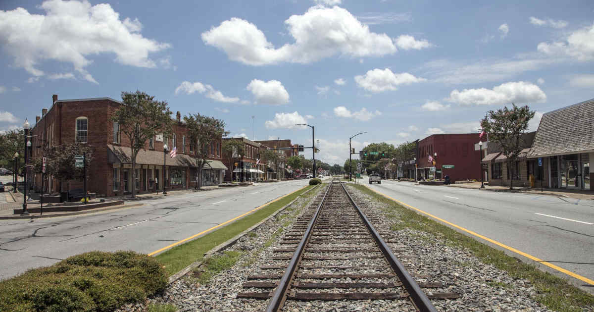 As in many Southern U.S. cities, a railroad track runs right down the middle of Commerce, Georgia's, main street | Credit: Carol M. Highsmith | License: Public Domain